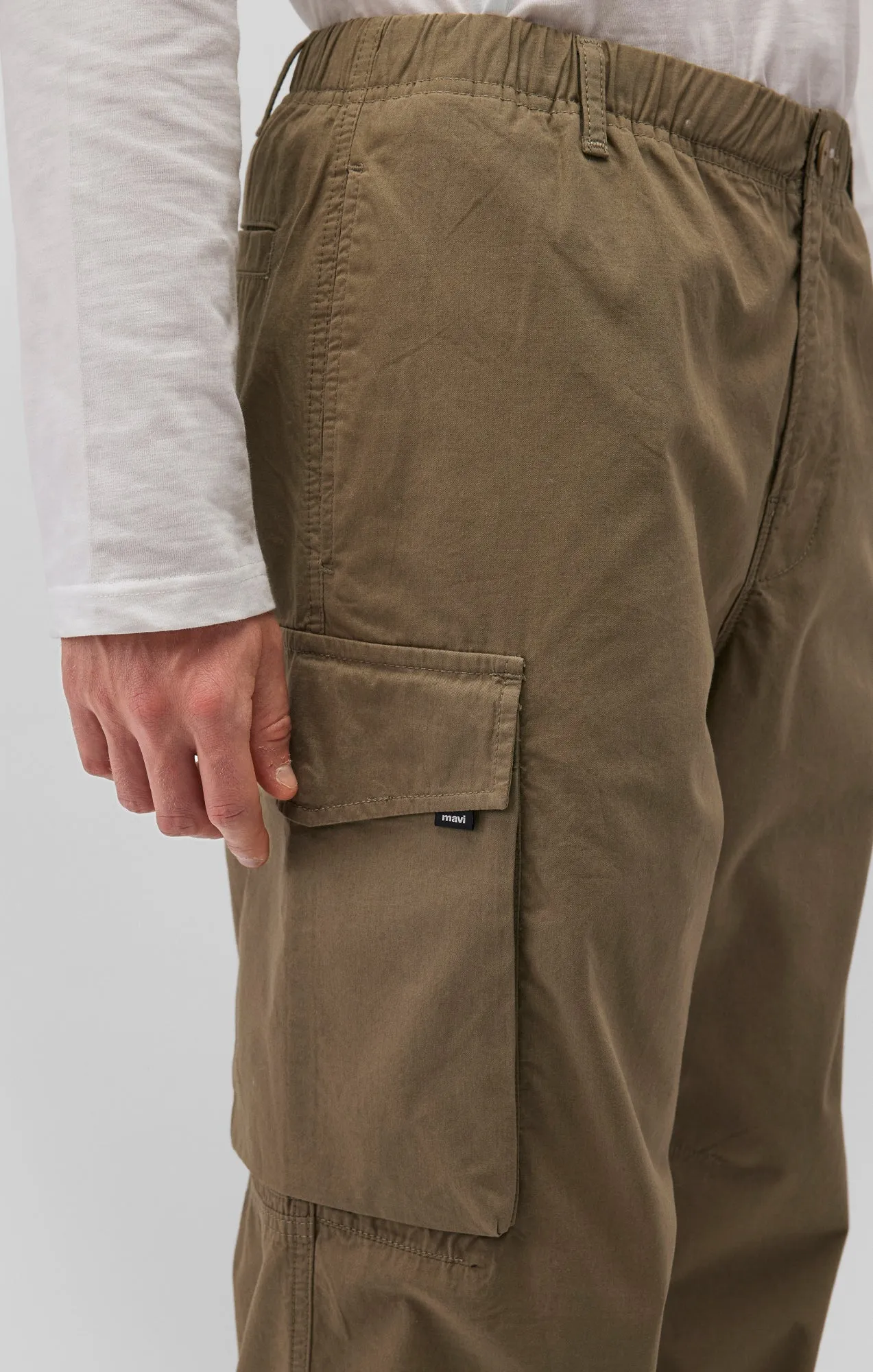 DOUBLE POCKET CARGO PANTS IN COVERT GREEN