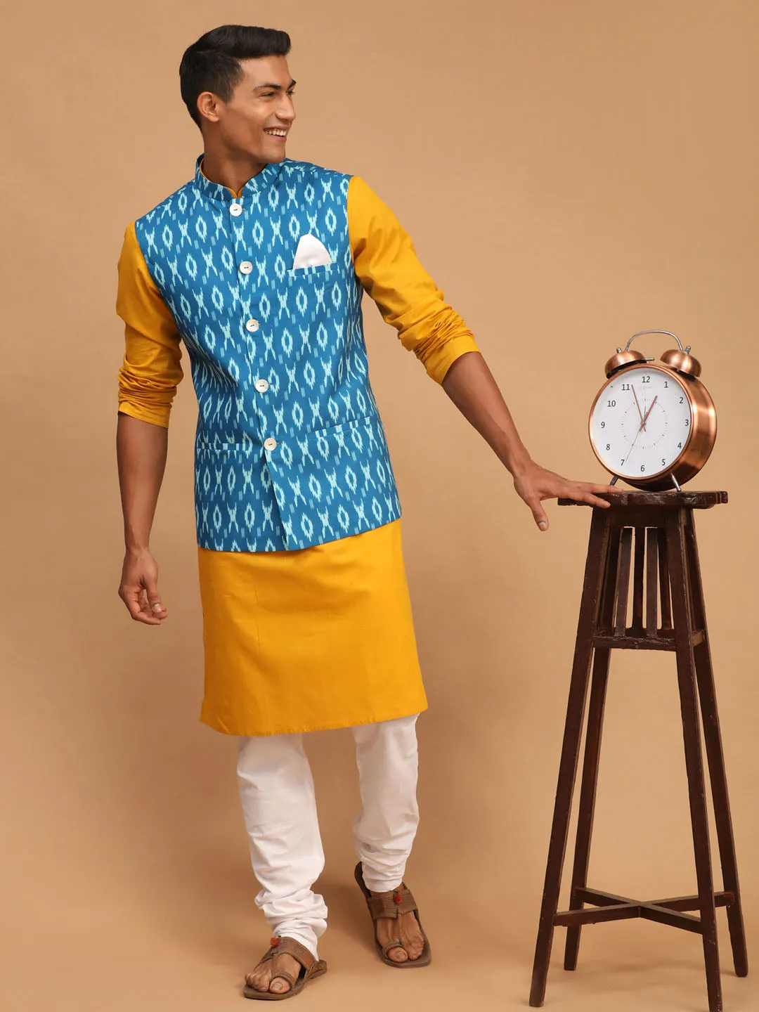 Jashvi Men's Turquoise Ikkat Printed Cotton Nehru Jacket With Mustard Kurta And White Pyjama Set