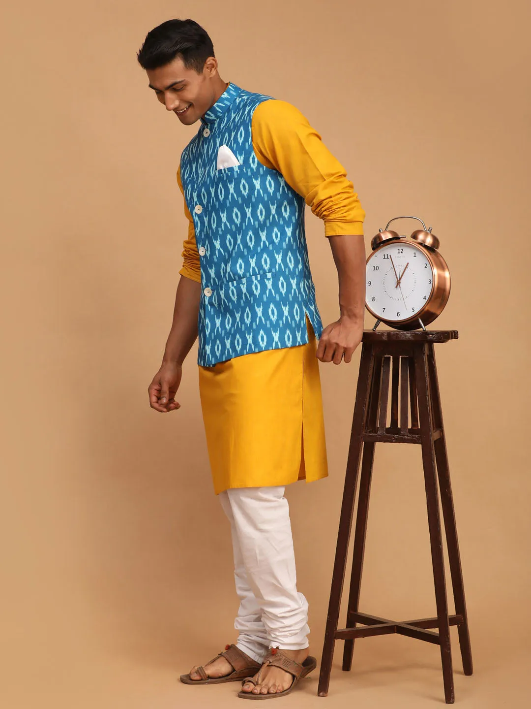 Jashvi Men's Turquoise Ikkat Printed Cotton Nehru Jacket With Mustard Kurta And White Pyjama Set