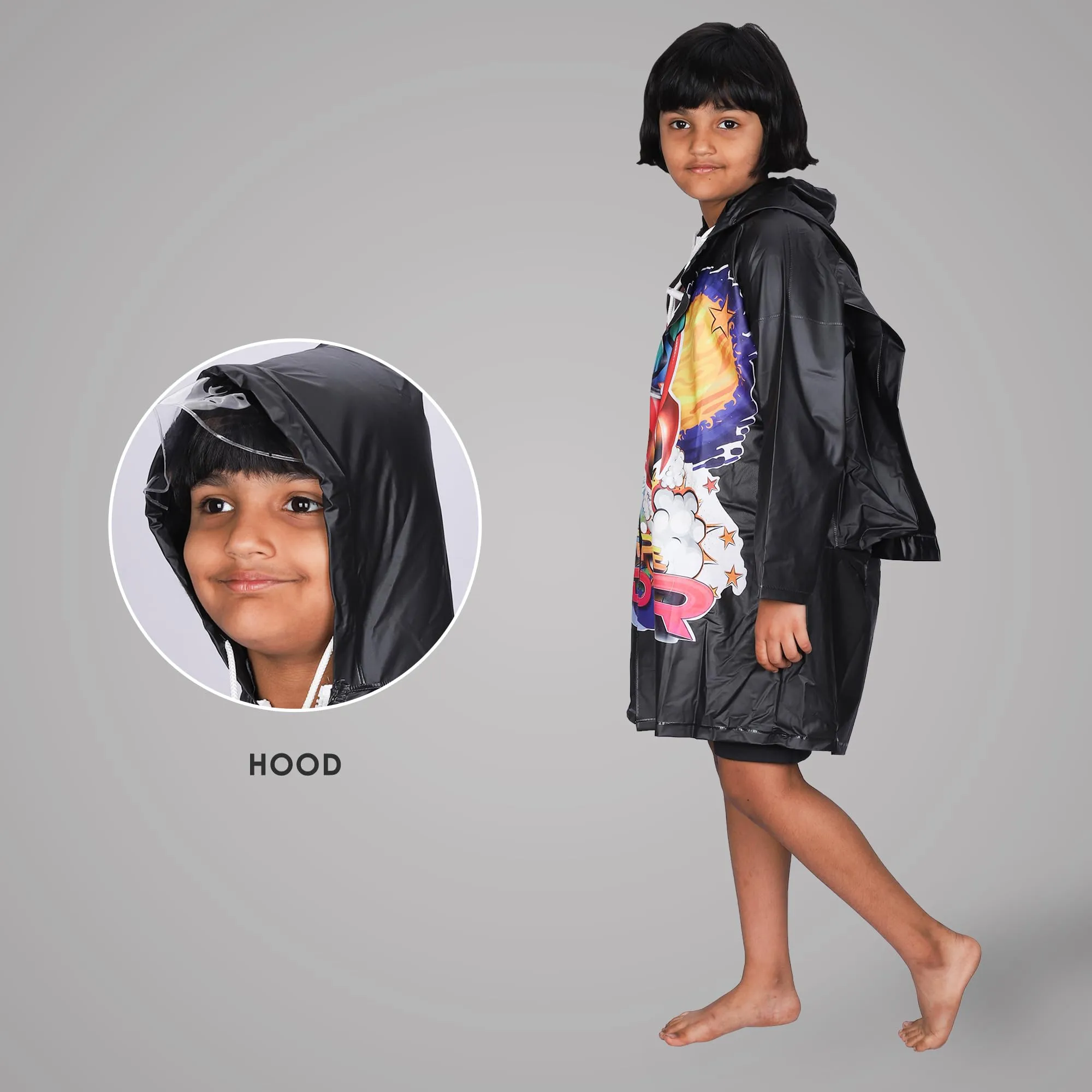 THE CLOWNFISH Toon Caper Series Kids Waterproof PVC Longcoat with Adjustable Hood & Extra Space for Backpack/Schoolbag Holding. Printed Plastic Pouch. Kid Age-4-5 years (Jet Black)